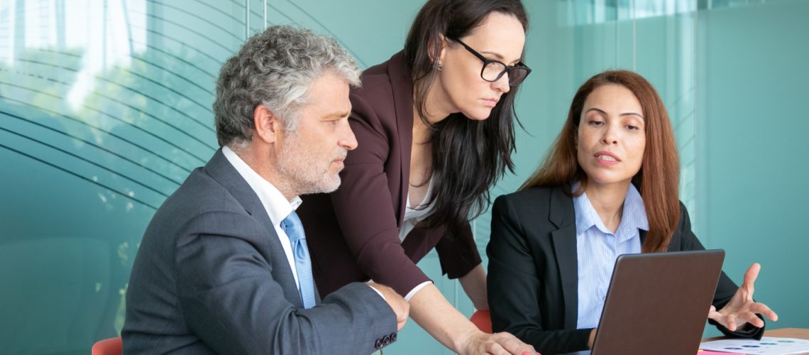 business-group-watching-presentation-discussing-project-meeting